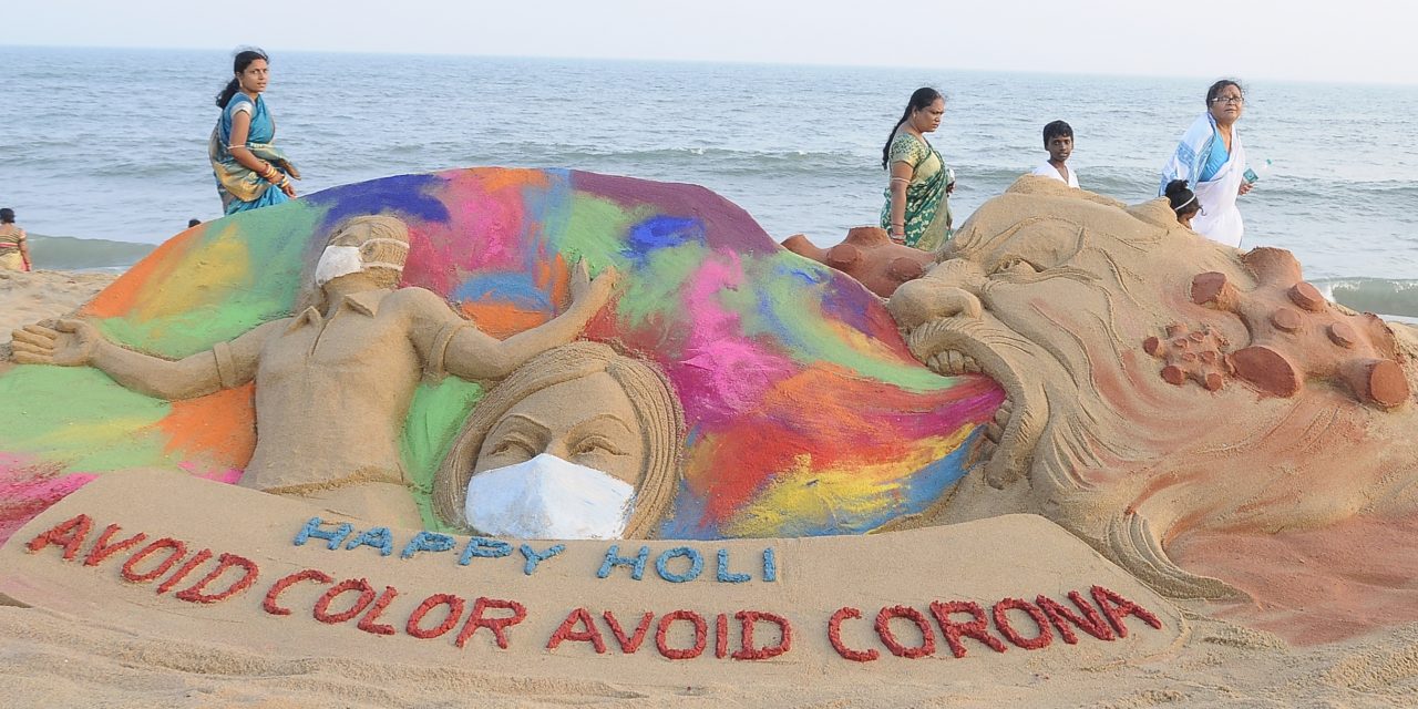 Sand art Holi message